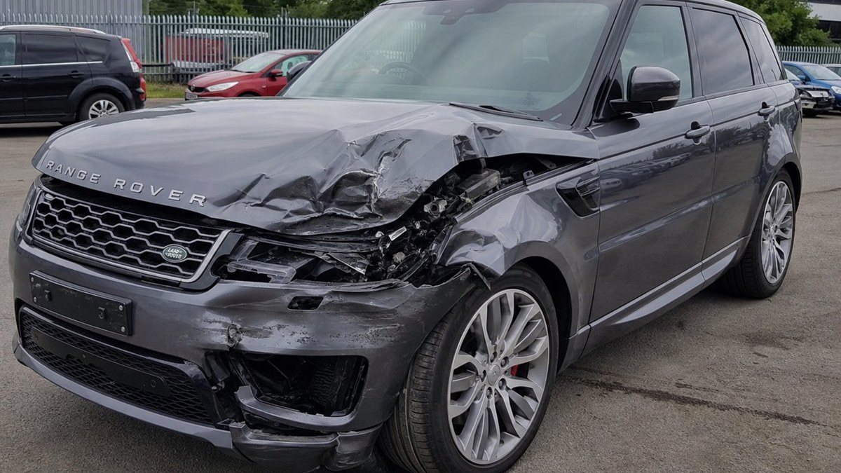 Crashed Range Rover after the accident